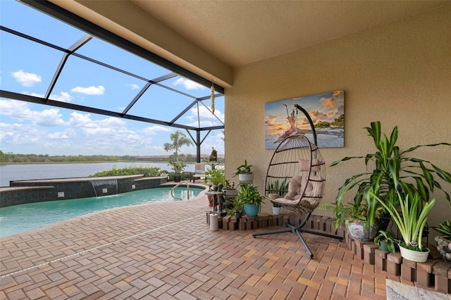 view of swimming pool with a water view, a patio, a lanai, and pool water feature