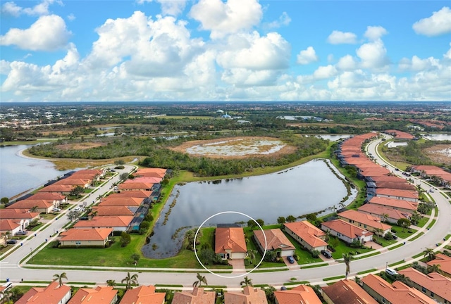 drone / aerial view featuring a water view