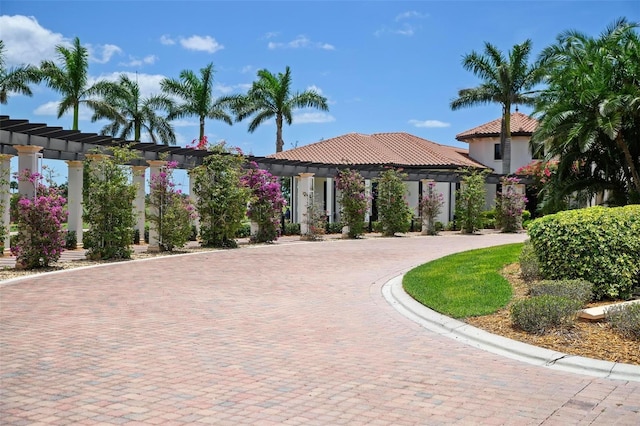 view of front of home featuring a pergola