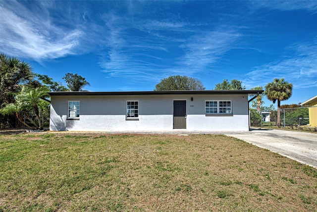 ranch-style house with a front yard