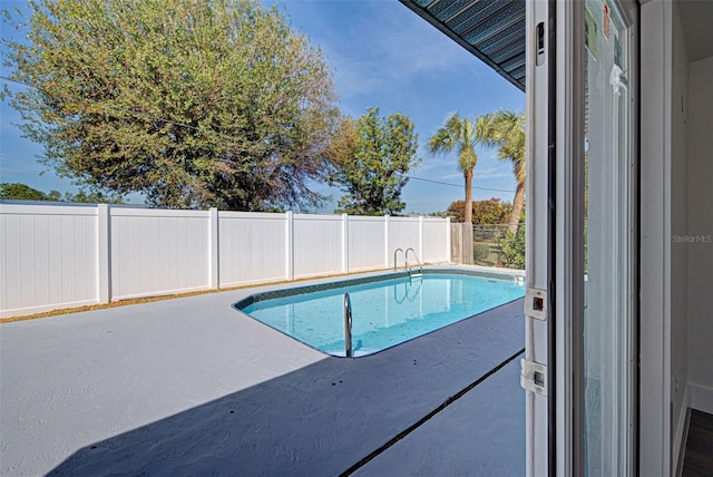 view of pool with a patio