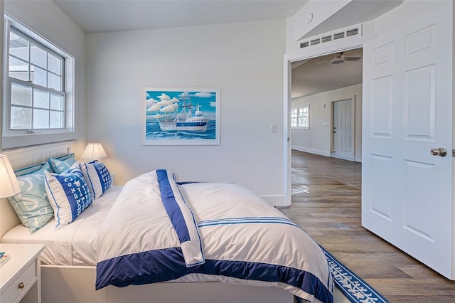 bedroom featuring wood-type flooring