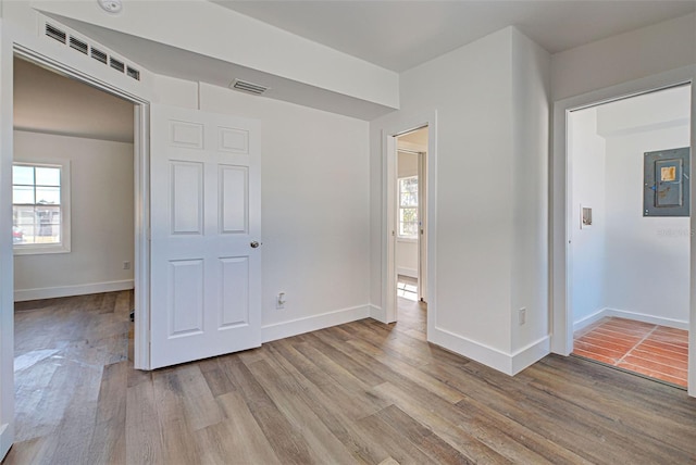 unfurnished bedroom featuring light hardwood / wood-style floors