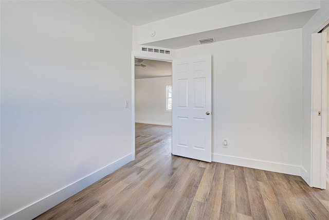 empty room featuring light hardwood / wood-style floors