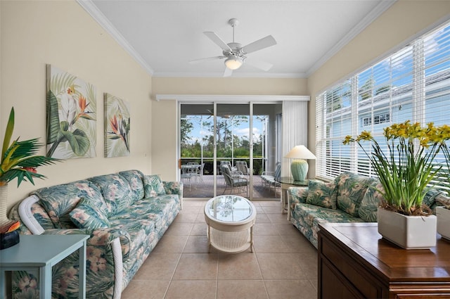 tiled living room with ornamental molding and ceiling fan