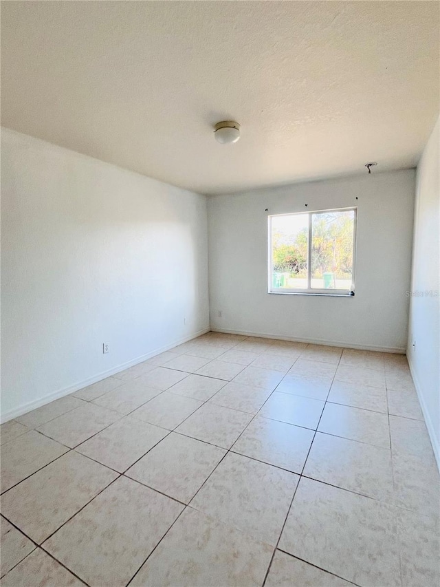 view of tiled empty room