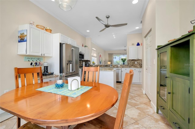 dining space with ceiling fan, light tile patterned floors, and recessed lighting