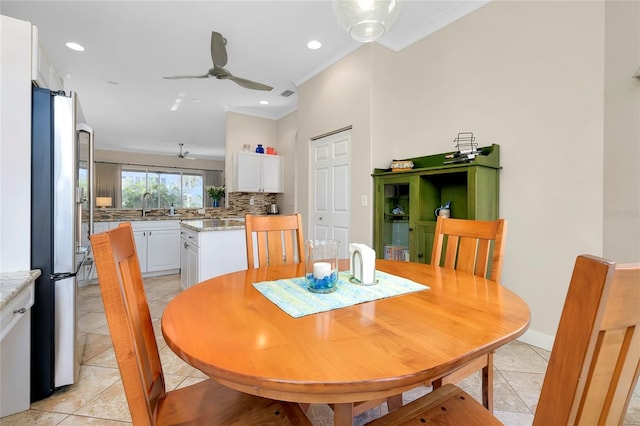 dining area with recessed lighting, ornamental molding, baseboards, and light tile patterned flooring