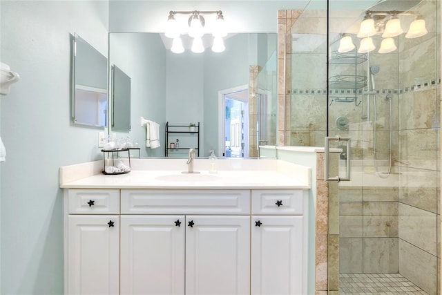 full bath with a shower stall and vanity