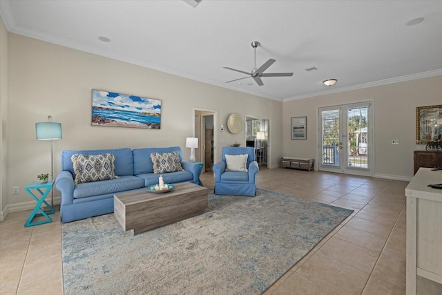 living room featuring ornamental molding, light tile patterned floors, ceiling fan, and french doors