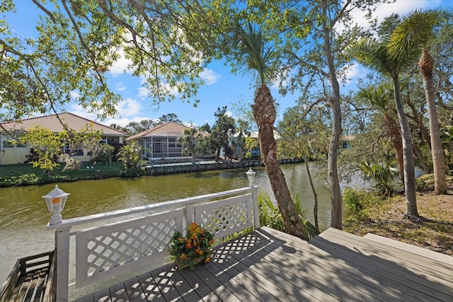 wooden terrace with a water view