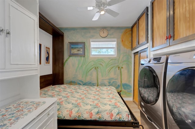 interior space featuring cabinet space, ceiling fan, washer and clothes dryer, and wallpapered walls