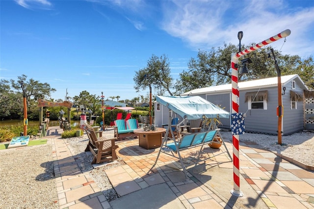 view of patio featuring an outdoor fire pit