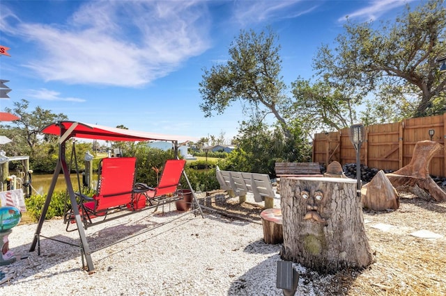 view of yard with a patio and fence