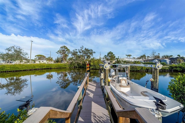 dock area featuring a water view and boat lift