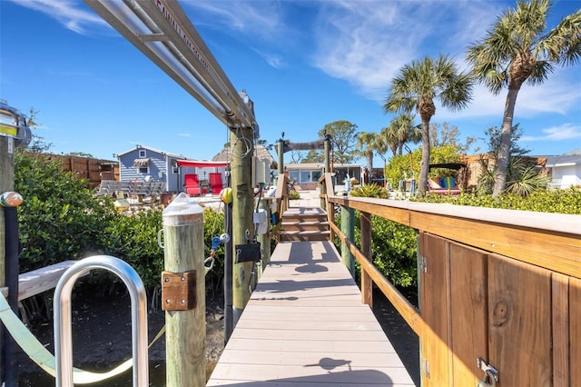 view of dock with boat lift