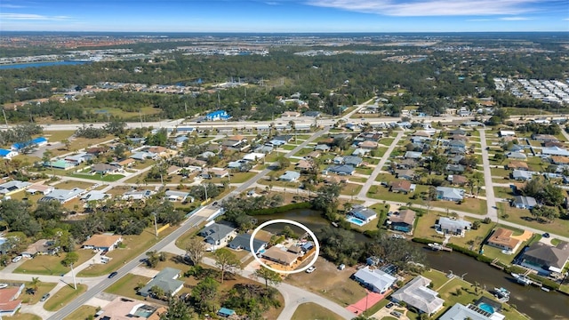 birds eye view of property with a residential view