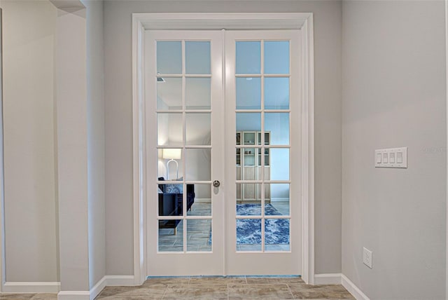 doorway to outside with french doors