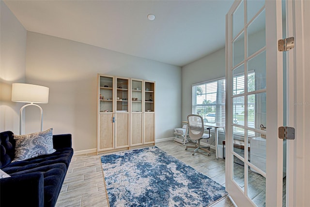 office featuring lofted ceiling