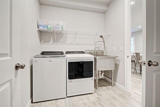 laundry area with washer and dryer