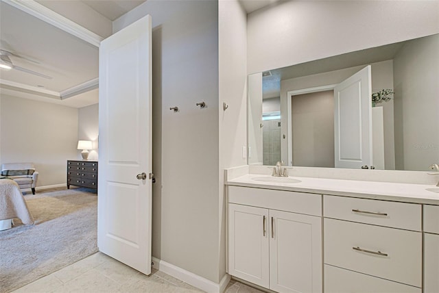 bathroom with tile patterned floors, vanity, and a shower