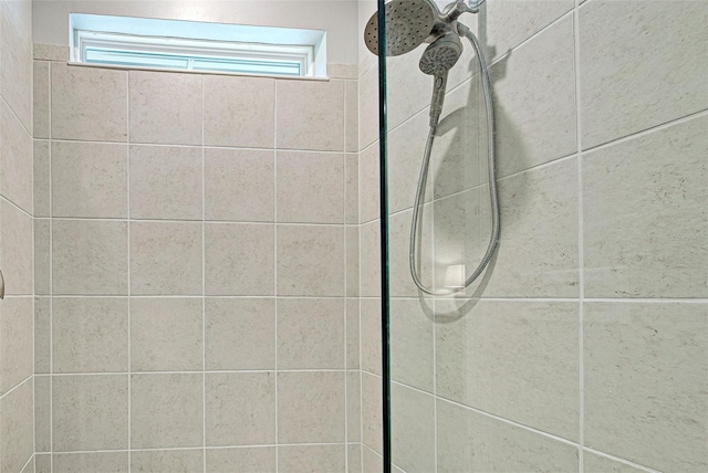 room details with a tile shower