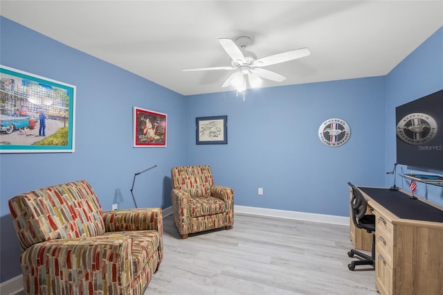 office with ceiling fan and light wood-type flooring