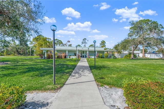 exterior space with a lawn