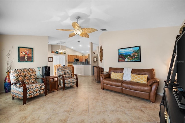 tiled living room with ceiling fan and lofted ceiling