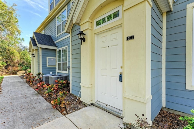 property entrance with central air condition unit