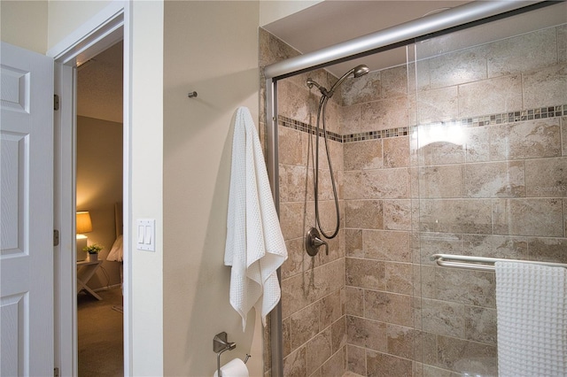 bathroom featuring an enclosed shower