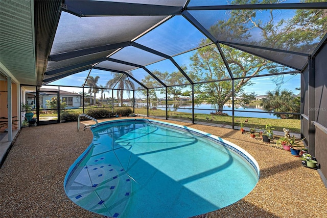 view of pool featuring a water view, a lanai, and a patio area