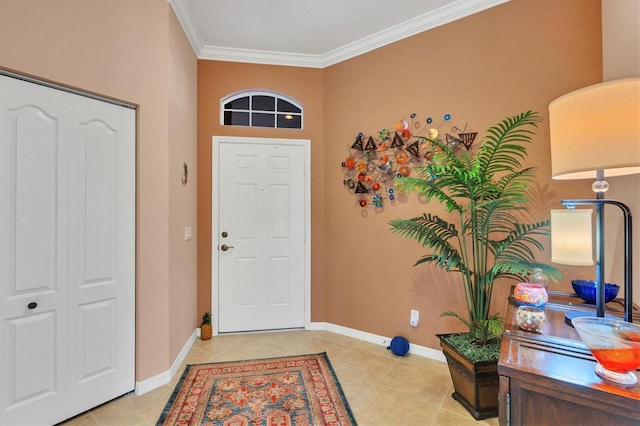 tiled foyer with crown molding