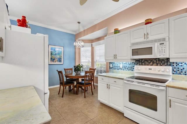 kitchen featuring pendant lighting, white appliances, crown molding, white cabinetry, and decorative backsplash