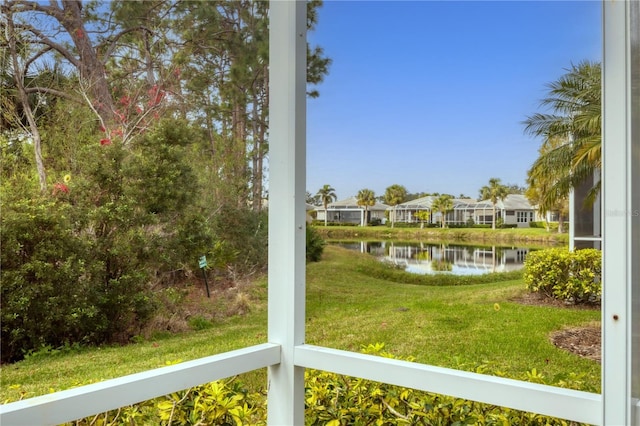 view of yard with a water view