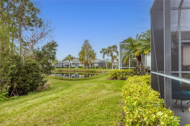 view of yard with a water view