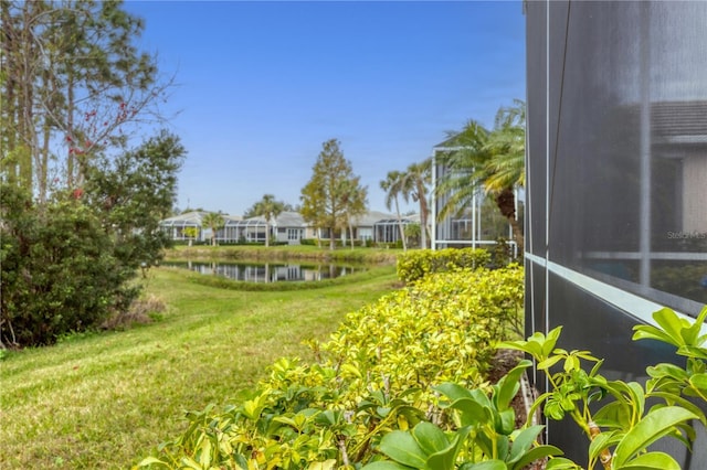 view of yard with a water view