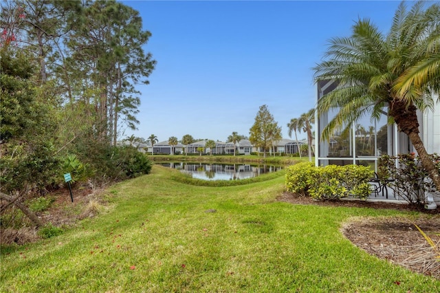 view of yard with a water view