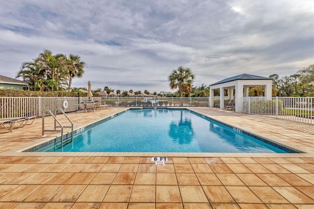 view of pool featuring a gazebo and a patio area