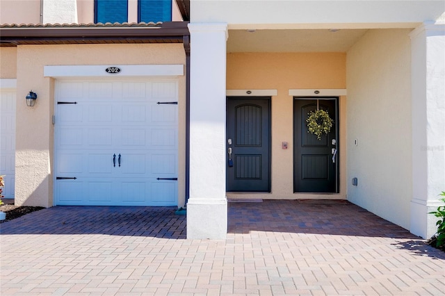 entrance to property with a garage