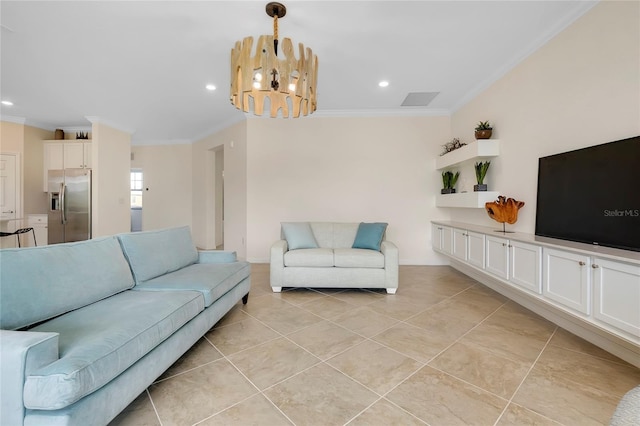 tiled living room featuring ornamental molding and a notable chandelier