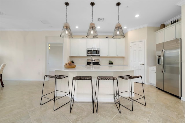 kitchen with sink, crown molding, appliances with stainless steel finishes, hanging light fixtures, and white cabinets