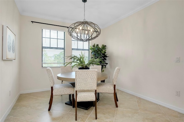 tiled dining space with an inviting chandelier and ornamental molding