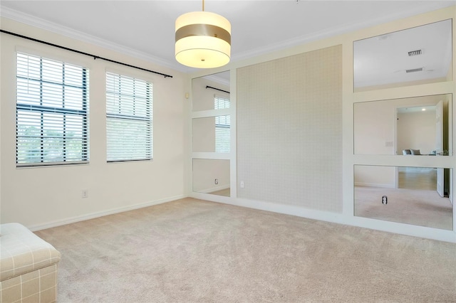 unfurnished bedroom featuring crown molding and carpet