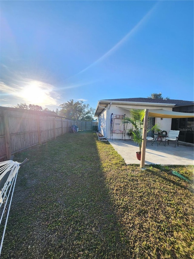 view of yard with a patio area