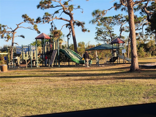 view of jungle gym featuring a yard