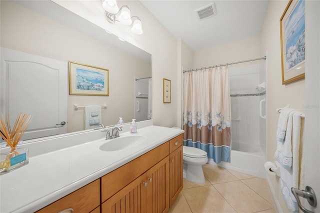 full bathroom with tile patterned floors, toilet, shower / tub combo, and vanity