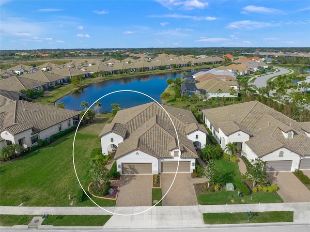 drone / aerial view featuring a water view