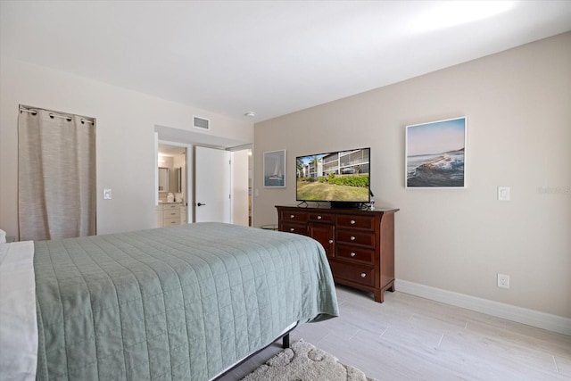 bedroom with light hardwood / wood-style flooring