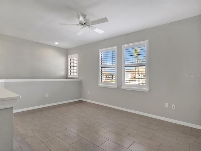 empty room featuring ceiling fan